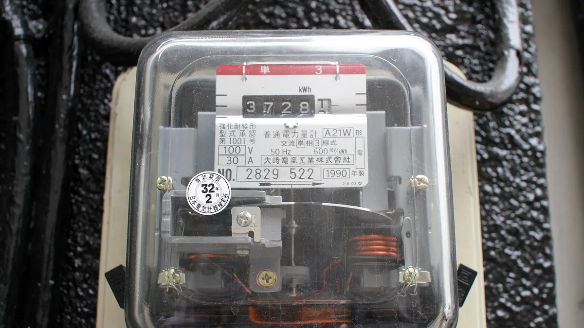 Analogue household electricity meter of the kind fitted outside Japanese homes